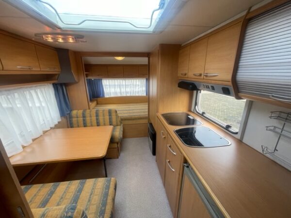 KNAUS Sudwind 550 bj.2004, 6 SLAAPPLAATSEN, DOUCHE, VOORTENT - Afbeelding 6