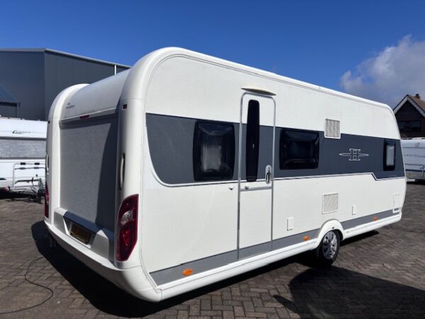 Hobby Excellent 560 KMFE bj.2014 met STAPELBED en VOORTENT!!! - Afbeelding 2